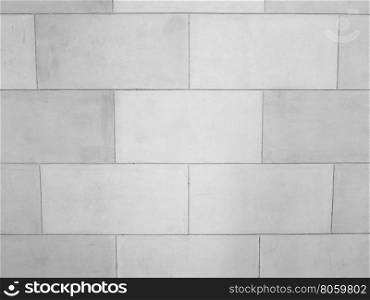 Yellow brick wall background in black and white. Yellow brick wall useful as a background in black and white