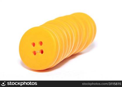 Yellow buttons on white isolated background