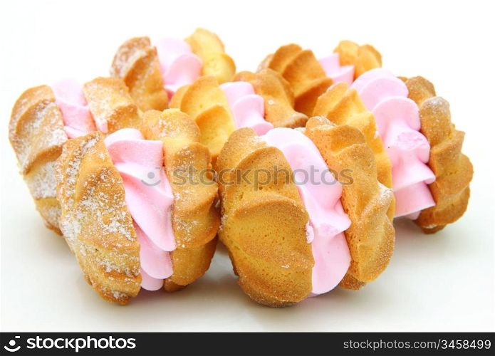 Yellow cookies with a stuffing on a white background