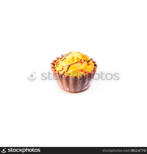 Yellow cupcake on white background. Chocolate Cake