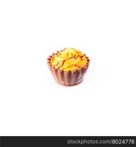 Yellow cupcake on white background. Chocolate Cake