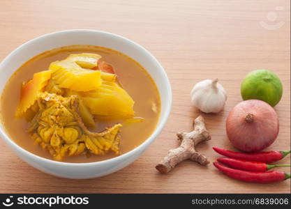 Yellow curry with fish and papaya,a popular local food in sounthern of Thailand