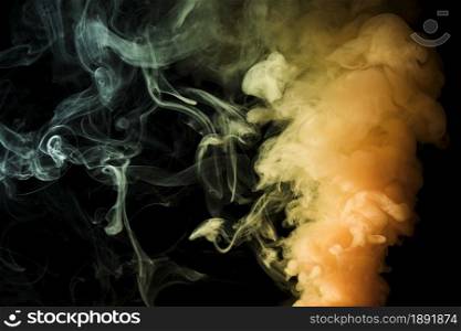 yellow dense fume smoke abstract black background. Resolution and high quality beautiful photo. yellow dense fume smoke abstract black background. High quality and resolution beautiful photo concept