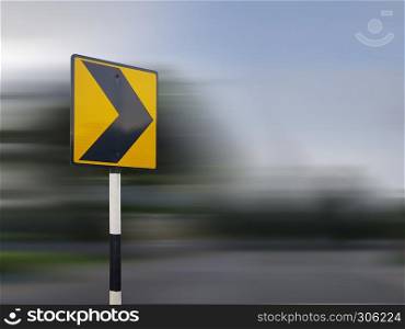 Yellow direction sign - road sign with arrow
