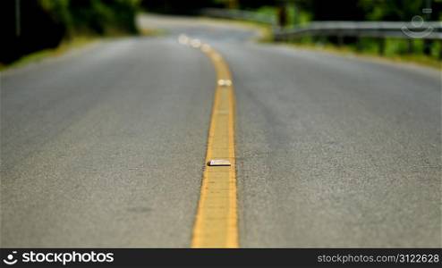 Yellow dividing line on the road