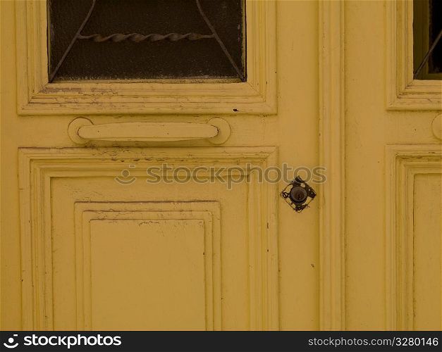 Yellow door in Mykonos Greece