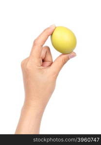 yellow easter egg in hand on white background