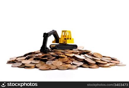 Yellow excavator on a big heap of coins