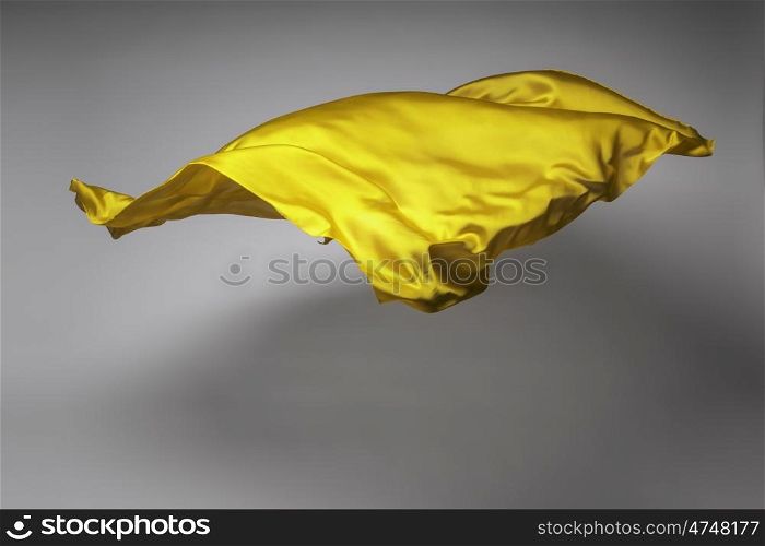 yellow flying fabric - art object, design element