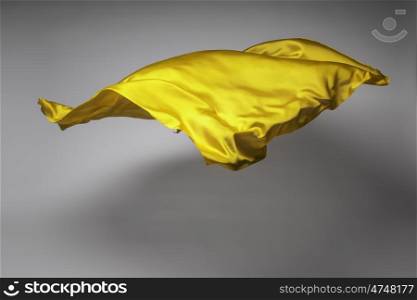 yellow flying fabric - art object, design element