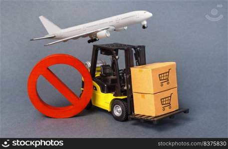 Yellow Forklift truck carries boxex and a red prohibition symbol NO. Embargo trade wars. Restriction on importation production, ban on export of dual-use goods to countries under sanctions