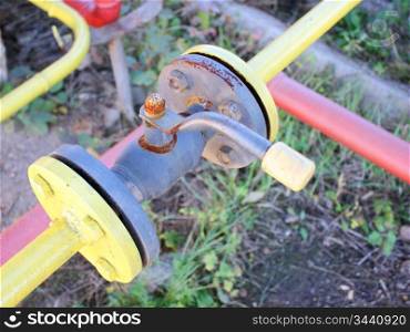 yellow gas pipe with a crane and gear