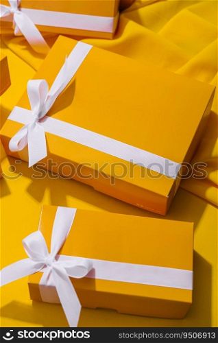Yellow gifts on a yellow background