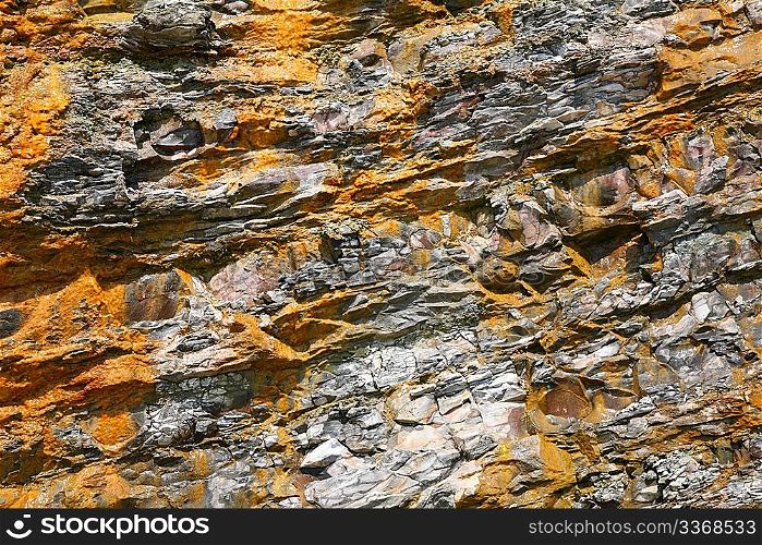 Yellow - grey rock background
