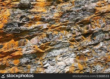 Yellow - grey rock background