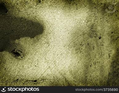 Yellow grungy background with crack and black paint
