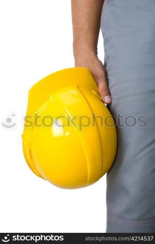 Yellow helmet at man hands isolated on a white