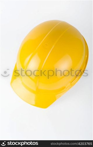 Yellow helmet closeup on a white background