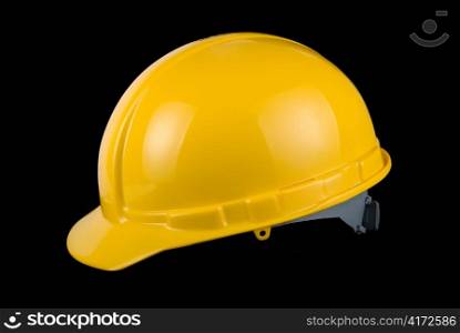 Yellow helmet isolated on a black background