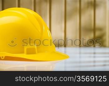 yellow helmet on white table