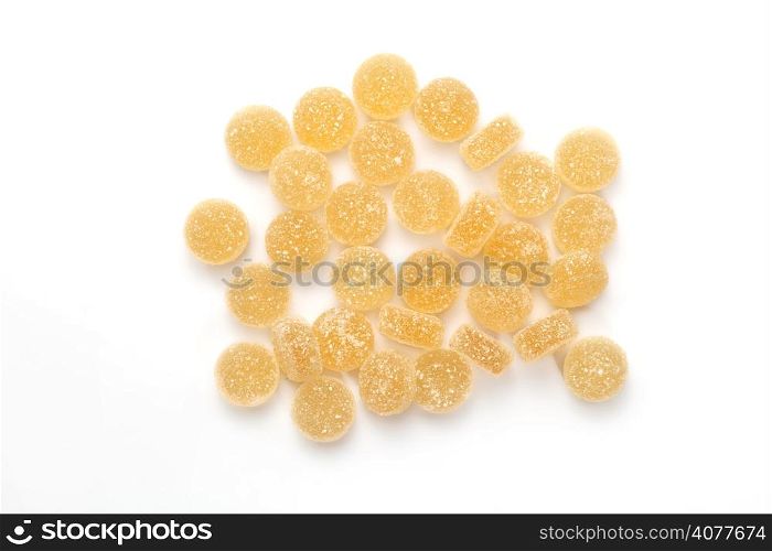 Yellow jelly candy on white background