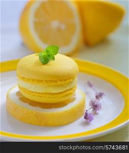 yellow lemon macaron and lemons