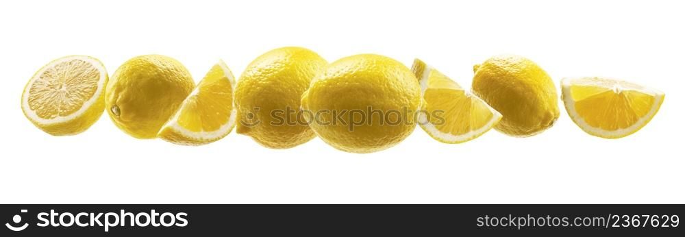 Yellow lemons levitate on a white background.. Yellow lemons levitate on a white background