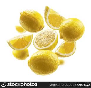 Yellow lemons levitate on a white background.. Yellow lemons levitate on a white background