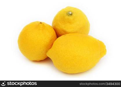 yellow lemons pile isolated on white