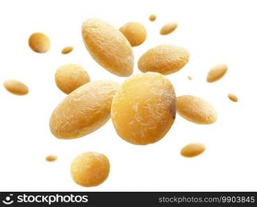 Yellow lentils levitate on a white background.. Yellow lentils levitate on a white background