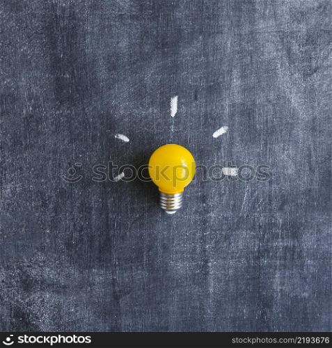 yellow light bulb chalkboard