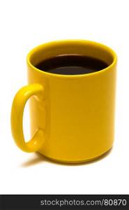 Yellow mug from coffee on a white background