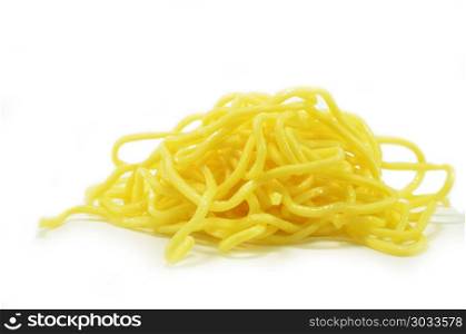 Yellow noodles isolated on a white background. Yellow noodles isolated