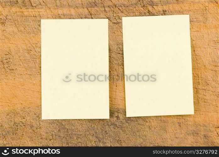 Yellow note paper on wooden background, rectangle note paper.