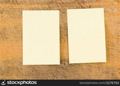 Yellow note paper on wooden background, rectangle note paper.