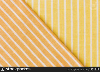 yellow orange fabric clothes backdrop. High resolution photo. yellow orange fabric clothes backdrop. High quality photo