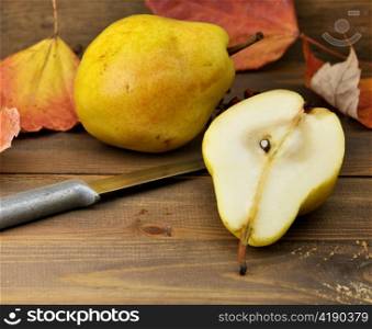 Yellow Pears On Wooden Background, Close Up