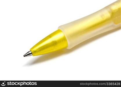 Yellow pen closeup on the white background