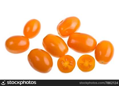 Yellow Perino tomatoes on a white background
