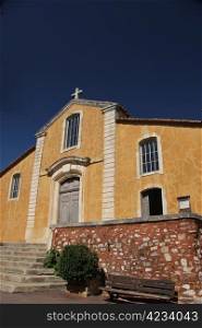Yellow plastered Church of Saint-Michel, Roussillon