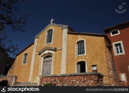 Yellow plastered Church of Saint-Michel, Roussillon