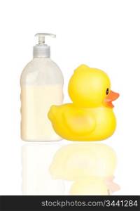 Yellow plastic duck and boat bath dispenser isolated on a over white background