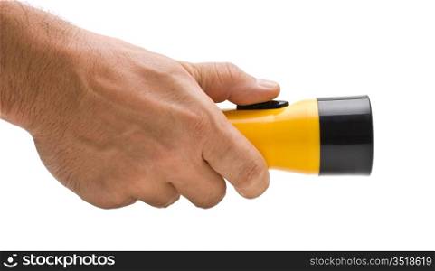 yellow plastic flashlight in hand isolated on white background