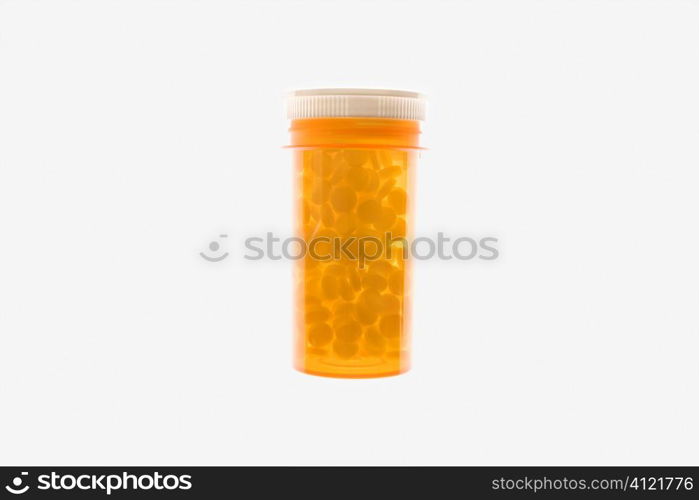 Yellow Plastic Medicine Bottle. Isolated