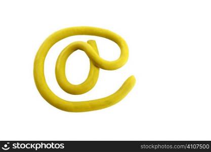 Yellow plasticine arroba email sign, isolated on white bgackground