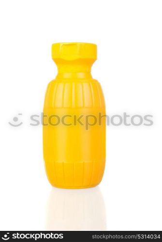 Yellow pot of mustard isolated on blacno background