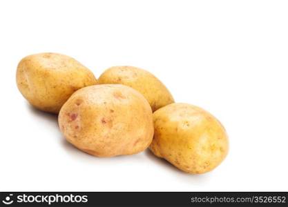 yellow potatoes in peel isolated on white