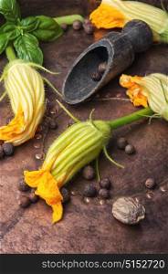 yellow pumpkin flower. Edible pumpkin flowers with spice on a retro background