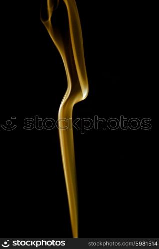 yellow ray of smoke abstract in black background