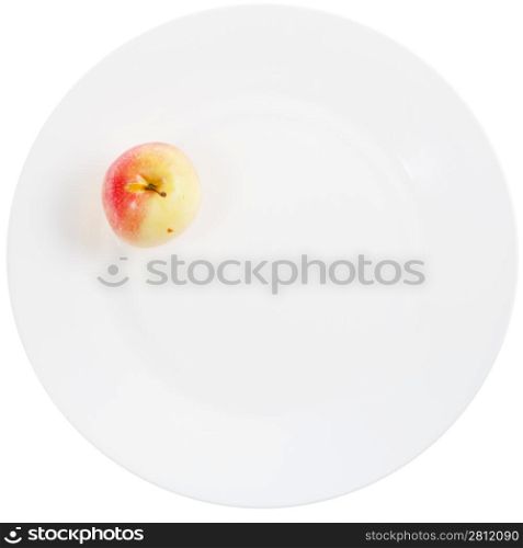 yellow red apple on white plate isolated on white background